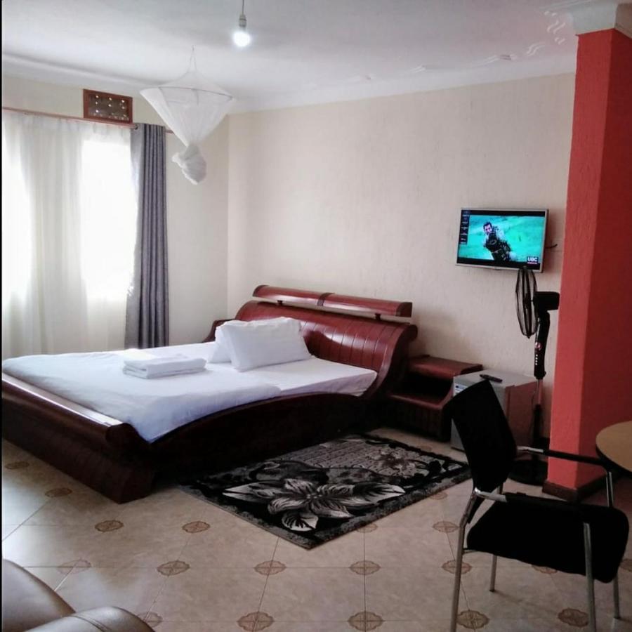 Migingo Suites Энтеббе Экстерьер фото