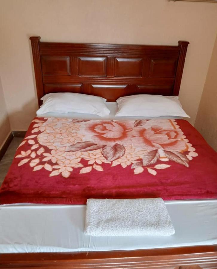 Migingo Suites Энтеббе Экстерьер фото