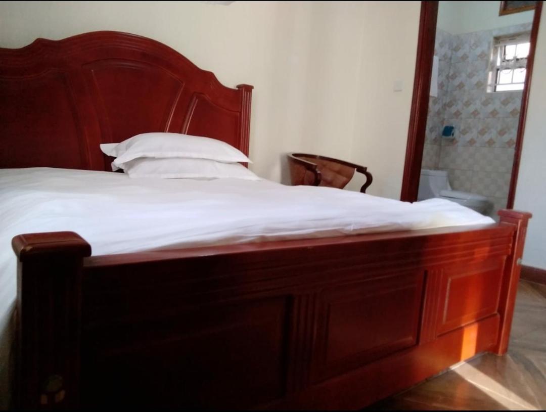 Migingo Suites Энтеббе Экстерьер фото