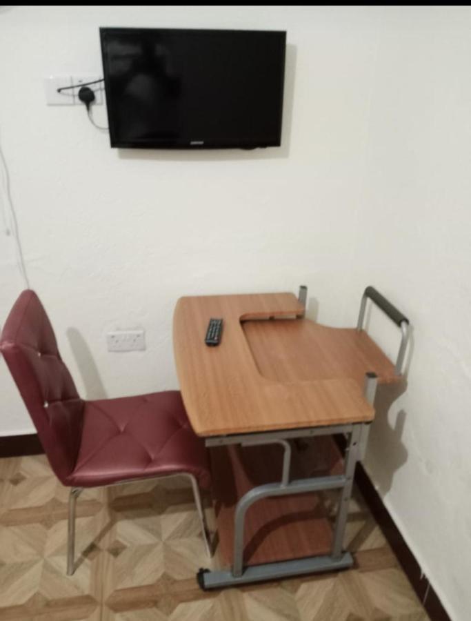 Migingo Suites Энтеббе Экстерьер фото