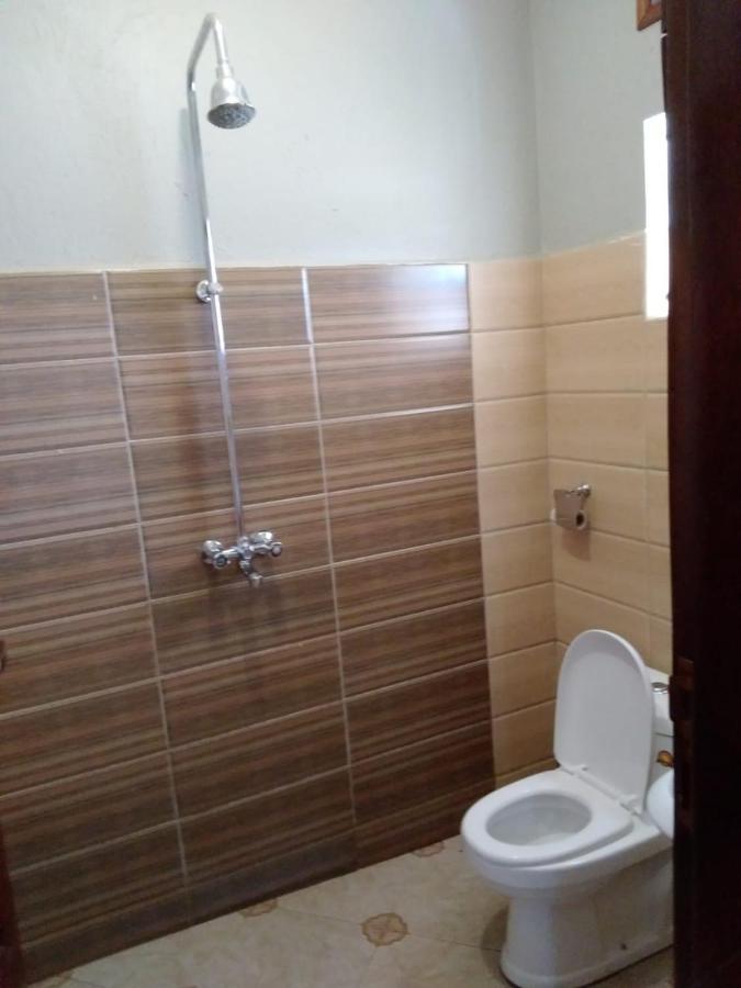 Migingo Suites Энтеббе Экстерьер фото