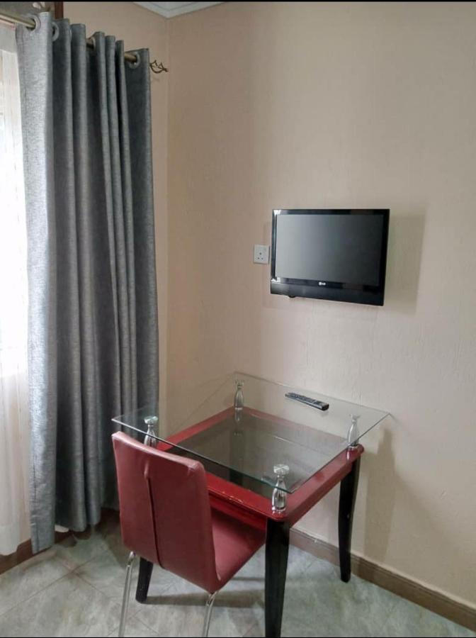 Migingo Suites Энтеббе Экстерьер фото
