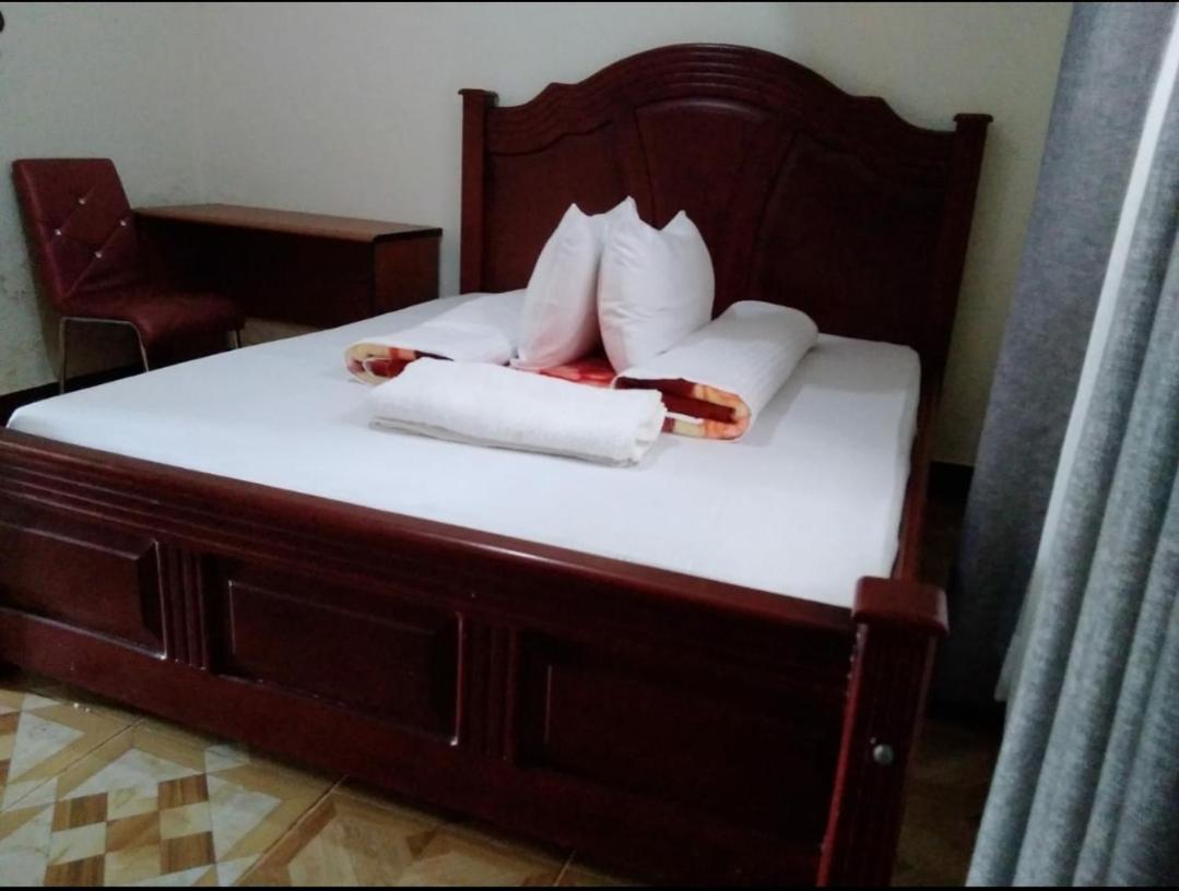 Migingo Suites Энтеббе Экстерьер фото