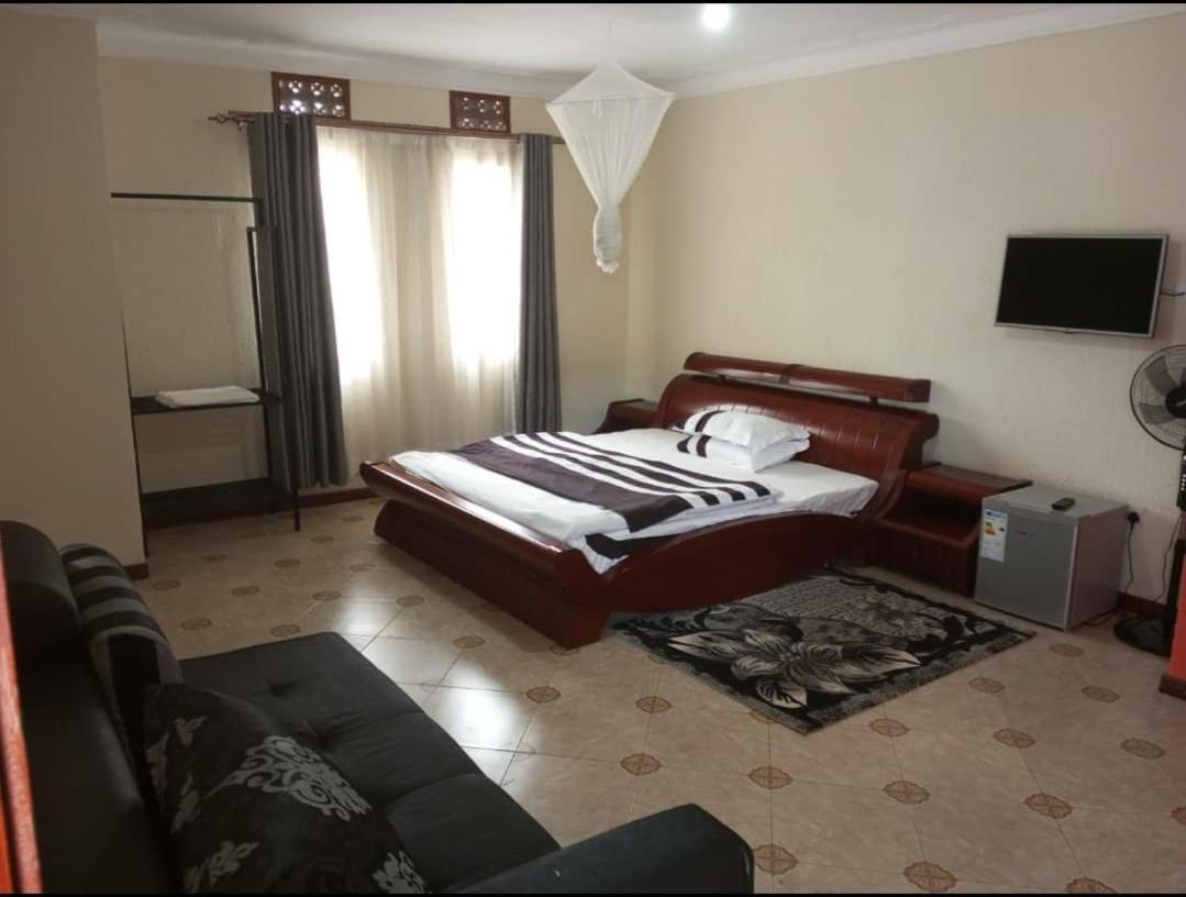 Migingo Suites Энтеббе Экстерьер фото